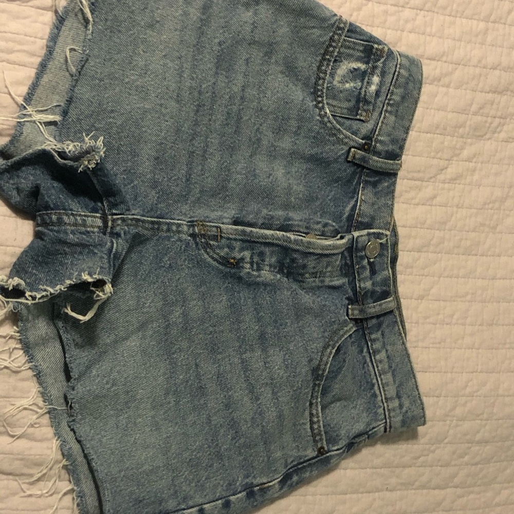 High waisted button up icon shorts.